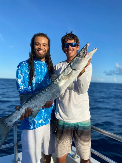 Family enjoying a fishing charter getaway in St. Augustine, FL